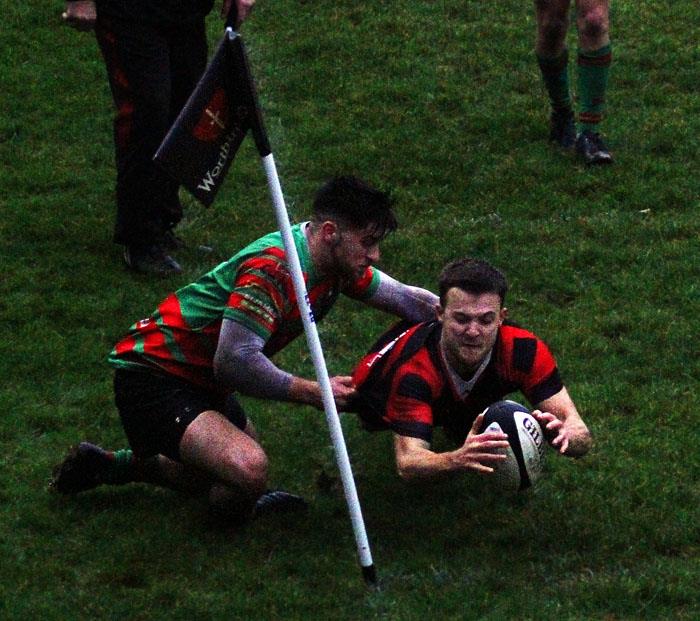 Matthew Morgan dives over for a try for Tenby